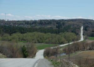 A lengthy road meandering down a valley in the Eastern Townships, near where a body was discovered decades ago.