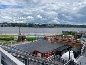 A serene view from a restaurant near Québec City, not focusing on the harbor or boats, but on the tranquil surroundings.